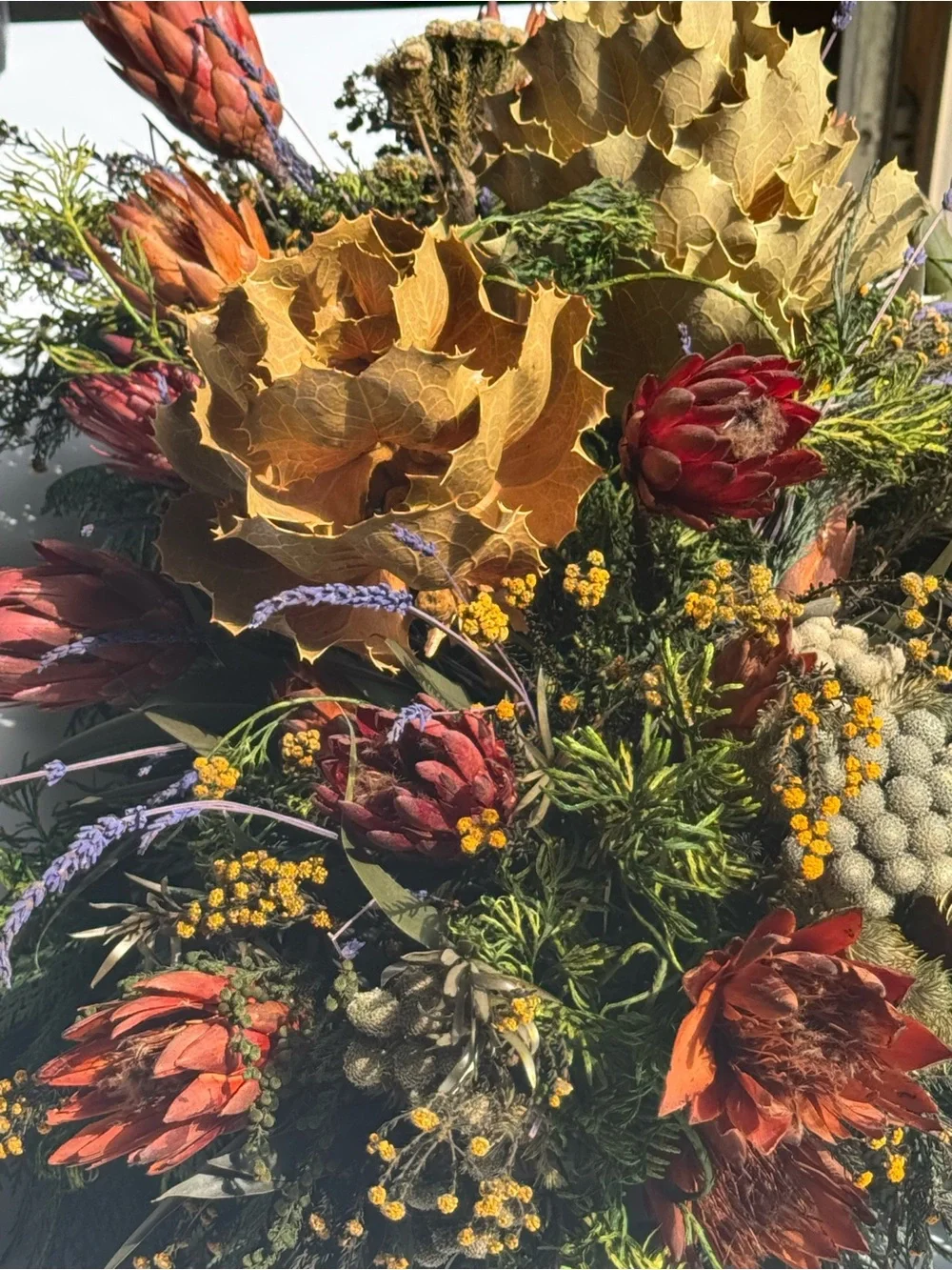 Autumn table center piece or decoration floral leaves full in planter box